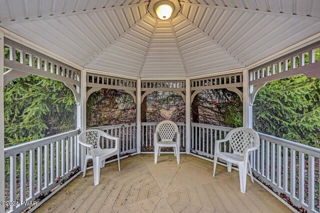 wooden terrace with a gazebo