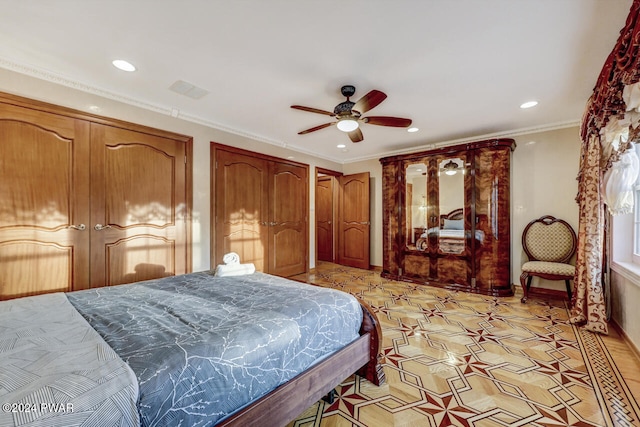 bedroom featuring ceiling fan and ornamental molding