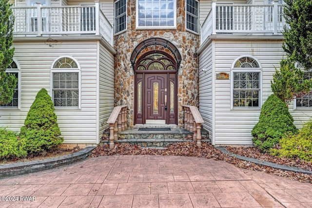 doorway to property with a balcony