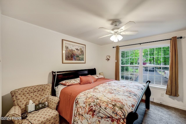 carpeted bedroom featuring ceiling fan