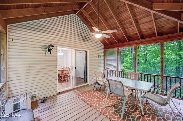 sunroom featuring wood ceiling, ceiling fan, and lofted ceiling with beams