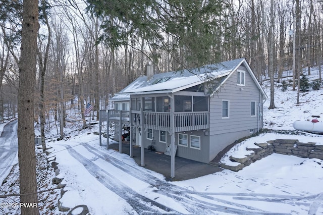 exterior space with a sunroom