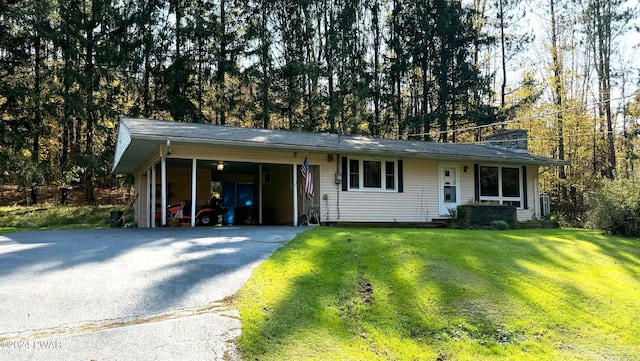 ranch-style house with a front lawn and a carport