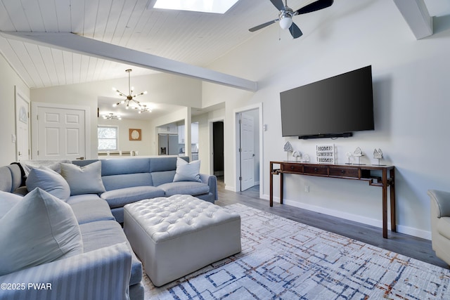 439 Gold Finch Rd, Bushkill, PA 18324 - living room featuring a chandelier, wood finished floors, a ceiling fan, baseboards, and wood ceiling
