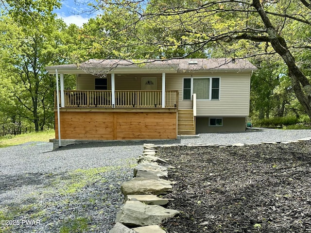 439 Gold Finch Rd, Bushkill, PA 18324 - view of front of property featuring a porch and stairs