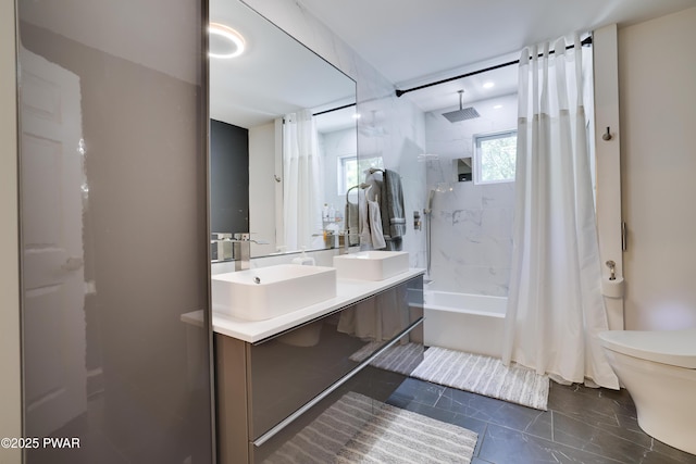 439 Gold Finch Rd, Bushkill, PA 18324 - bathroom featuring double vanity, a combined bath / shower with rainfall shower, and toilet