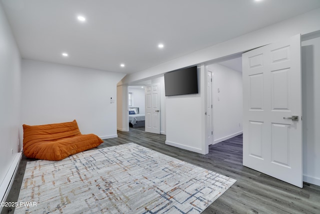 439 Gold Finch Rd, Bushkill, PA 18324 - bedroom with wood finished floors, recessed lighting, baseboards, and baseboard heating
