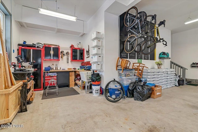 garage with a workshop area and bike storage