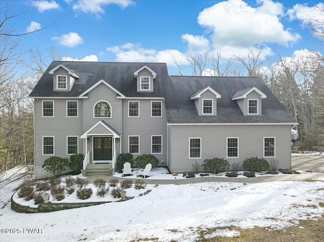 view of front of home featuring a shingled roof