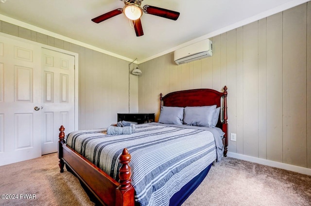 bedroom featuring a wall mounted air conditioner, ceiling fan, crown molding, and carpet flooring