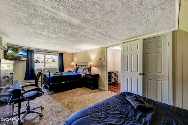 bedroom with carpet floors and a baseboard radiator