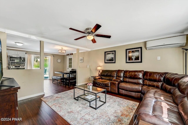 living room with dark hardwood / wood-style floors, an AC wall unit, ceiling fan, and crown molding