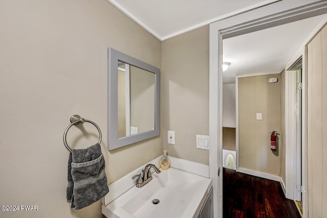 bathroom featuring vanity and hardwood / wood-style flooring