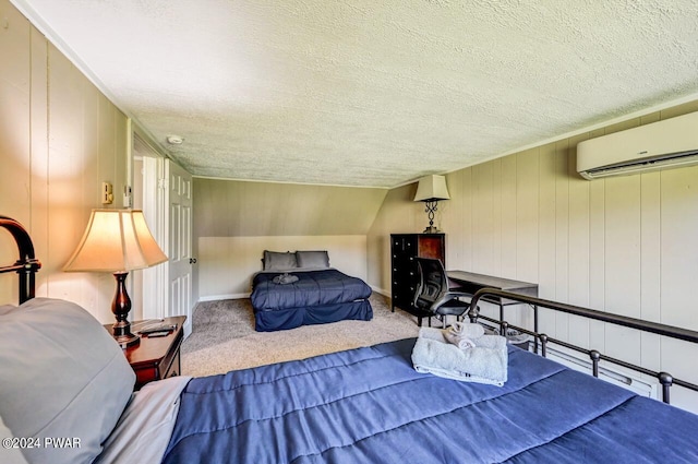 bedroom featuring carpet, an AC wall unit, a textured ceiling, and vaulted ceiling