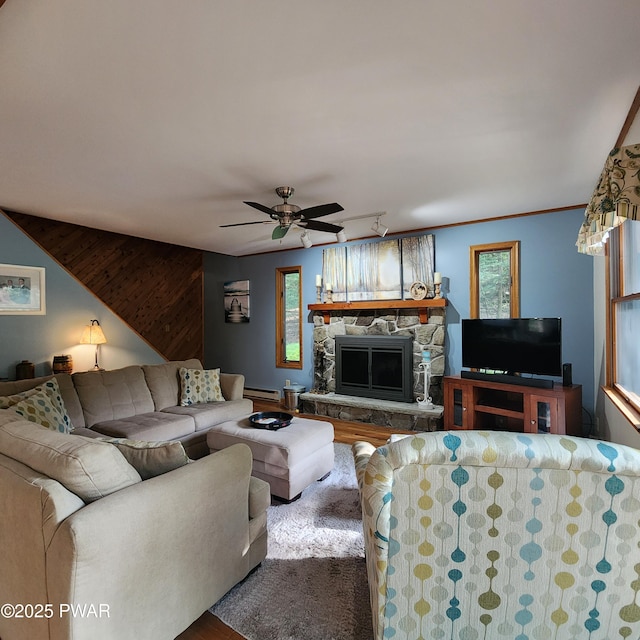 101 Deer Run, Greentown, PA 18451 - living room with wood finished floors, a fireplace, a ceiling fan, and healthy amount of natural light
