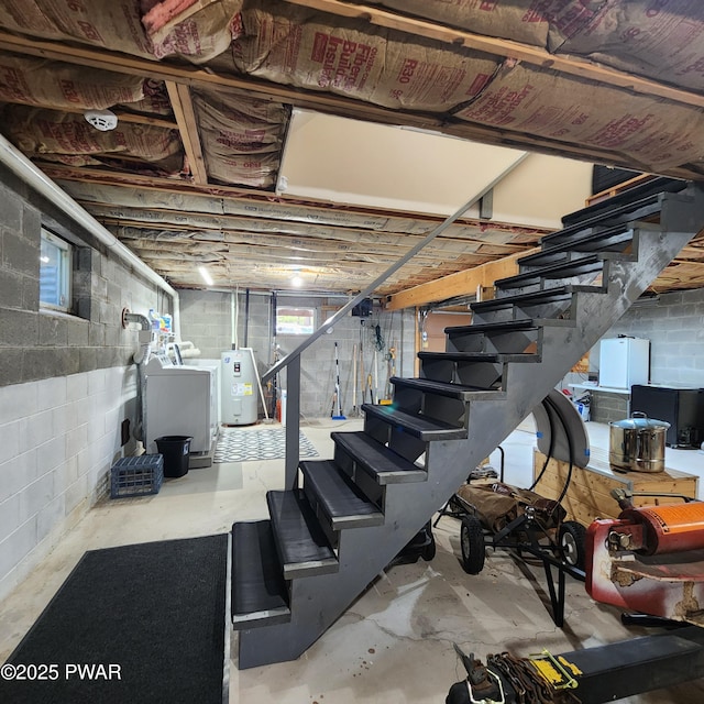 101 Deer Run, Greentown, PA 18451 - basement with water heater, stairs, and washing machine and clothes dryer