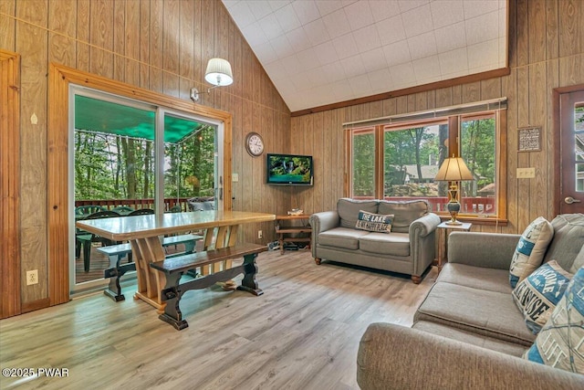1474 Lakeland Dr, Lake Ariel, PA 18436 - living room featuring wooden walls, high vaulted ceiling, and wood finished floors