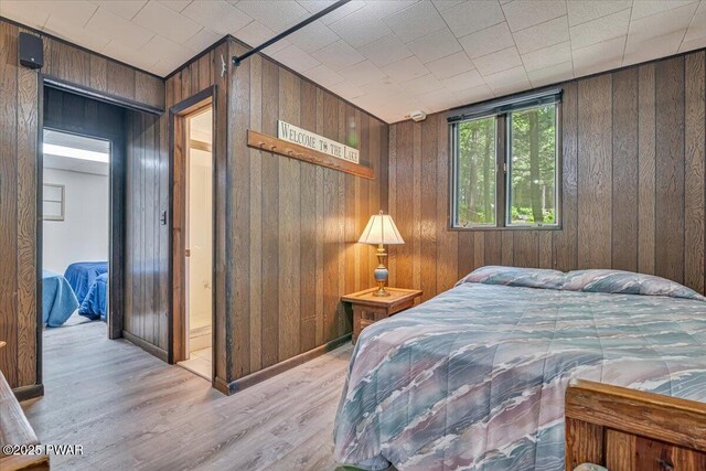 1474 Lakeland Dr, Lake Ariel, PA 18436 - bedroom with wood walls and wood finished floors