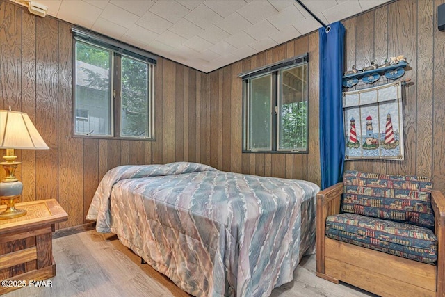 1474 Lakeland Dr, Lake Ariel, PA 18436 - bedroom with wood finished floors and wooden walls