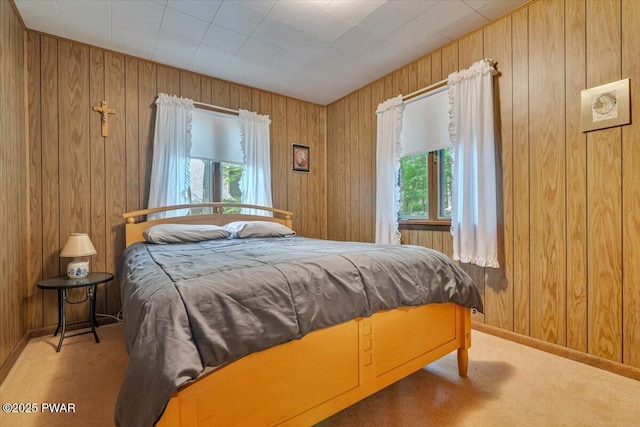 1474 Lakeland Dr, Lake Ariel, PA 18436 - carpeted bedroom featuring wooden walls and baseboards