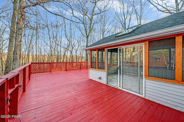 wooden terrace with a sunroom