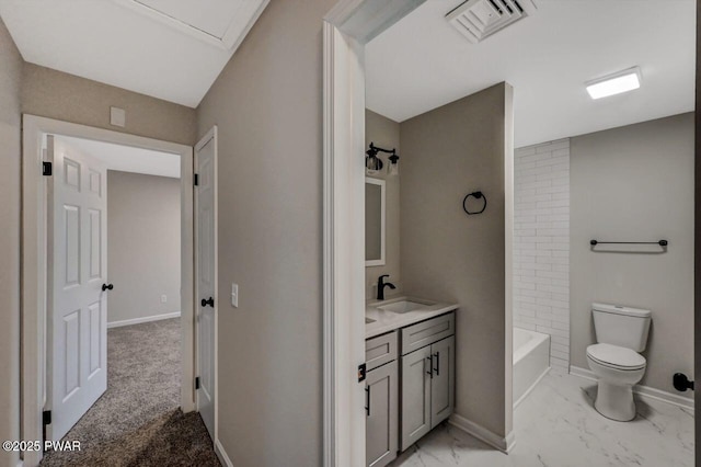 bathroom featuring vanity and toilet