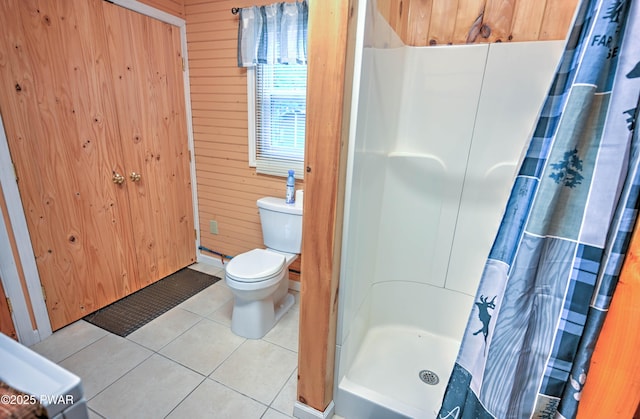 121 Ness Rd, Dingmans Ferry, PA 18328 - full bath with tile patterned floors, a stall shower, and wooden walls