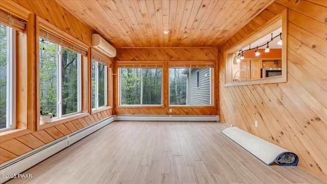 142 Bloss Rd, Canadensis, PA 18325 - unfurnished sunroom with baseboard heating, a wall mounted AC, wood walls, wood finished floors, and wooden ceiling