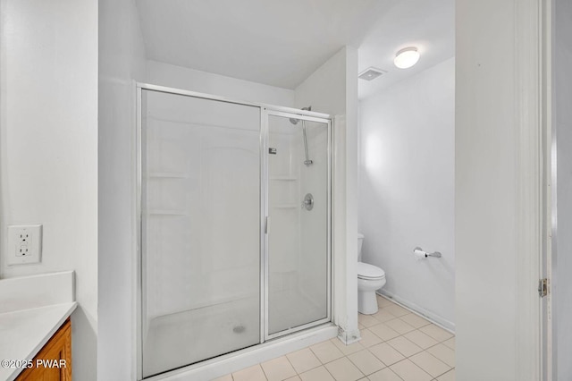 full bath featuring vanity, a stall shower, tile patterned flooring, toilet, and visible vents