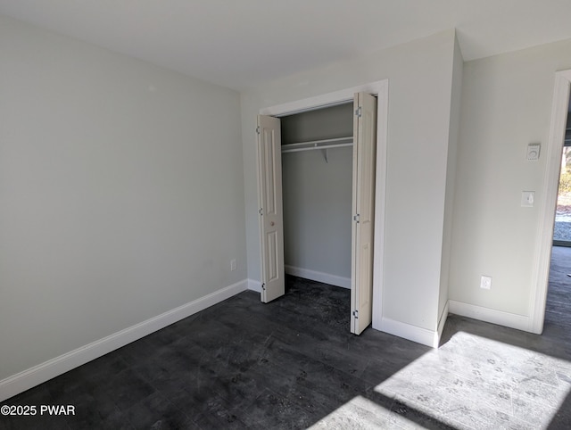 unfurnished bedroom with a closet