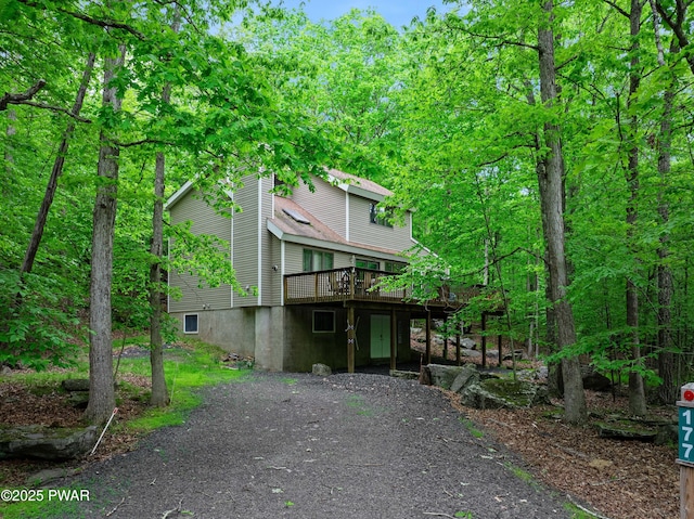 177 Candlewick Way, Lackawaxen, PA 18435 - view of front of home with a wooden deck and gravel driveway