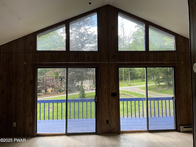 110 Parkwood Dr # 154, Lake Ariel, PA 18436 - detailed view of wooden walls, wood finished floors, and a baseboard radiator