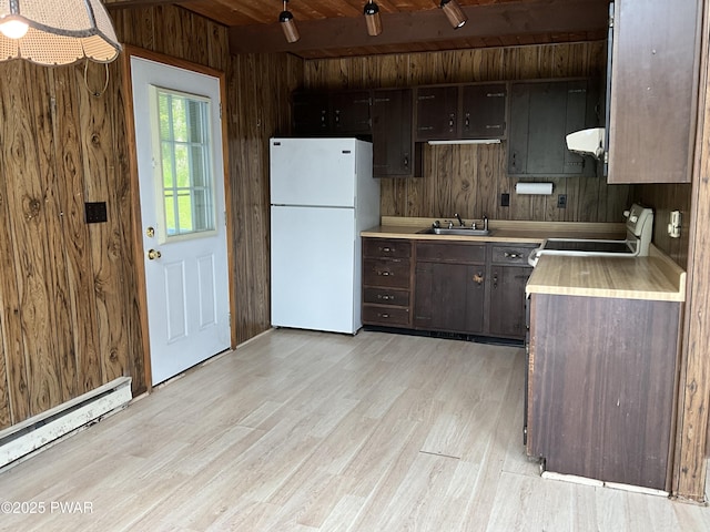 110 Parkwood Dr # 154, Lake Ariel, PA 18436 - kitchen featuring freestanding refrigerator, range with electric stovetop, light countertops, a baseboard heating unit, and extractor fan