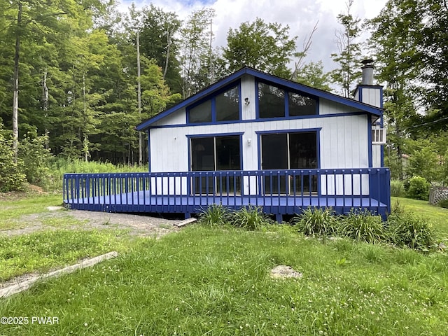 110 Parkwood Dr # 154, Lake Ariel, PA 18436 - rear view of house with a wooden deck and a chimney