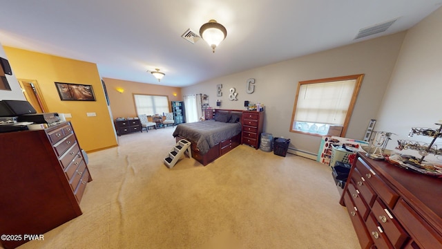 bedroom featuring baseboard heating and light carpet