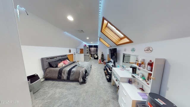 bedroom featuring light colored carpet and vaulted ceiling with skylight