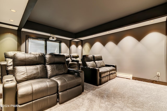 carpeted home theater with a baseboard radiator