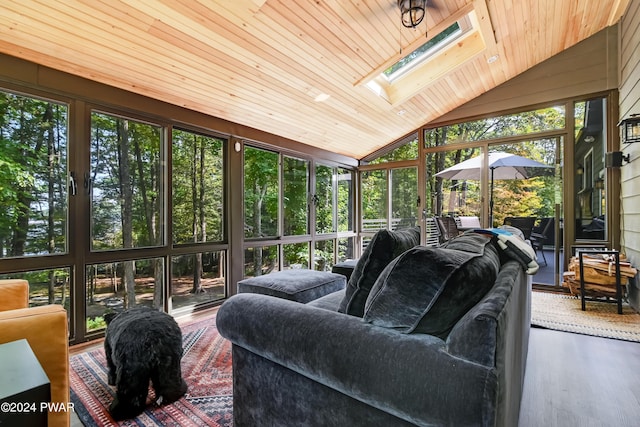 sunroom / solarium with lofted ceiling with skylight and wooden ceiling