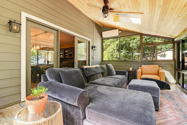 sunroom / solarium featuring ceiling fan, a wall mounted air conditioner, lofted ceiling with skylight, plenty of natural light, and wood ceiling