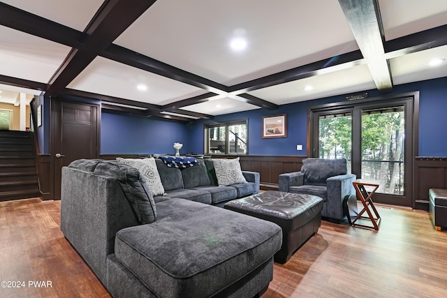 living room featuring hardwood / wood-style floors, beamed ceiling, and coffered ceiling