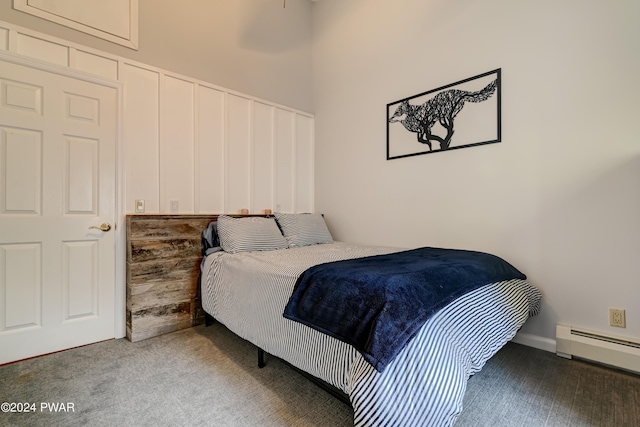 bedroom featuring a baseboard heating unit