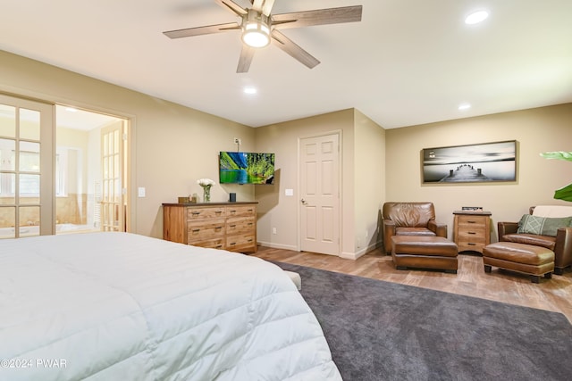 bedroom featuring light hardwood / wood-style flooring and ceiling fan