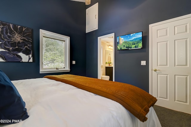 bedroom featuring connected bathroom