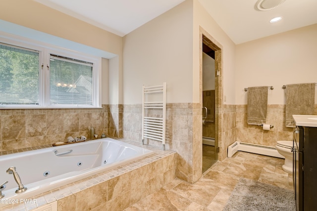 full bathroom with vanity, radiator, toilet, tile walls, and a baseboard radiator