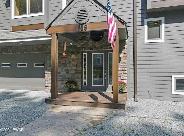 entrance to property featuring a garage