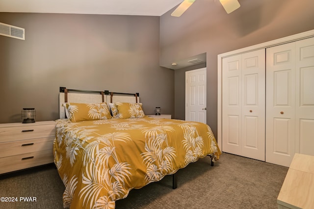 carpeted bedroom with ceiling fan and a closet