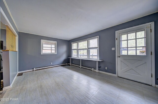 unfurnished living room featuring a baseboard radiator, baseboards, and a baseboard heating unit