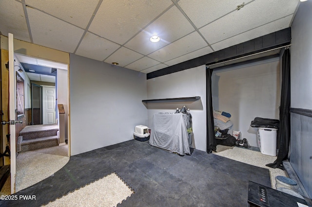 interior space with a drop ceiling