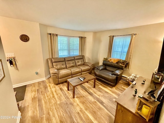 living room with light hardwood / wood-style floors