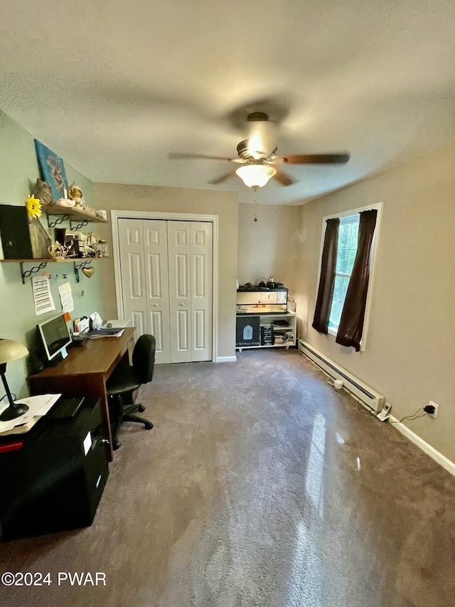 office area featuring a baseboard radiator and ceiling fan